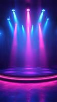 Bright stage lights illuminate a performance area with vibrant colors at night photo