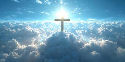 Cross illuminated by sunlight above fluffy clouds in a clear blue sky during midday photo