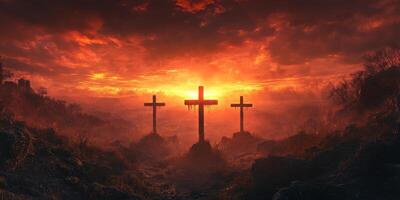 Three crosses silhouetted against a dramatic sunset over a desolate landscape with dark clouds and glowing sky photo