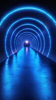 Beautiful illuminated tunnel with blue lights creating a stunning visual pathway at nighttime photo