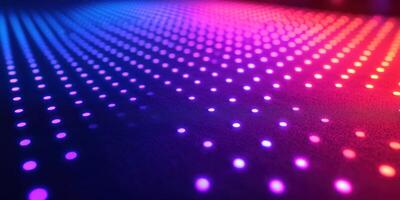 Colorful LED lights create a mesmerizing display on a dark surface at an indoor event photo