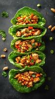 Fresh and healthy lettuce wraps filled with savory chicken and crunchy vegetables photo