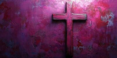 Wooden cross illuminated against vibrant textured wall showcasing rich colors photo