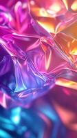 Colorful reflections on crinkled foil create a vibrant abstract background photo