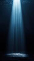 Light pierces through darkness illuminating a secluded space photo