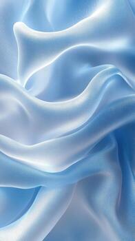 Soft blue satin fabric drapes elegantly, showcasing luxurious texture and gentle waves in natural light photo