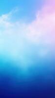 Soft gradient sky with serene blue and pink hues at sunset near a tranquil coastline photo