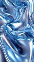 Shimmering blue metallic fabric creating elegant folds and curves in soft light photo