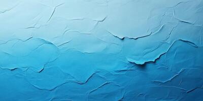 Textured blue background with subtle variations and creases captured in soft lighting during the daytime photo