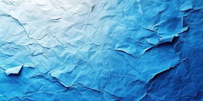Textured blue paper background with crumpled folds ideal for creative designs and backgrounds photo