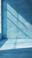 Bright blue interior space with natural shadows in soft light creating a serene atmosphere photo