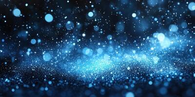 Sparkling blue particles create a vibrant atmosphere in a dark setting during an artistic display photo