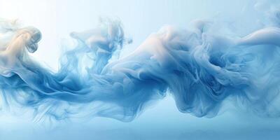 Fluid movement of blue and white smoke creating an ethereal atmosphere with soft textures in a tranquil setting photo