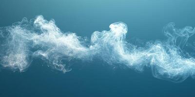 Swirling white smoke against a blue background creates an ethereal and tranquil ambiance photo