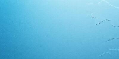 Textured blue background with subtle wrinkles and natural imperfections enhancing visual depth and interest photo