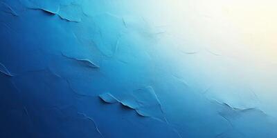 Textured abstract blue wall with subtle variations in tone and light, creating a calming atmosphere photo