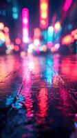 Nighttime city streets illuminated by colorful reflections in the rain during a vibrant urban atmosphere photo