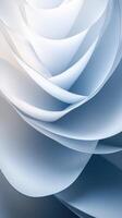Abstract layers of delicate paper resembling a blooming flower in shades of blue create a tranquil visual experience photo
