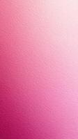Soft pink gradient background with subtle texture creating a calming atmosphere for design projects photo