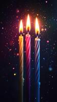 Colorful birthday candles illuminate a dark background with sparkling lights during a festive celebration photo