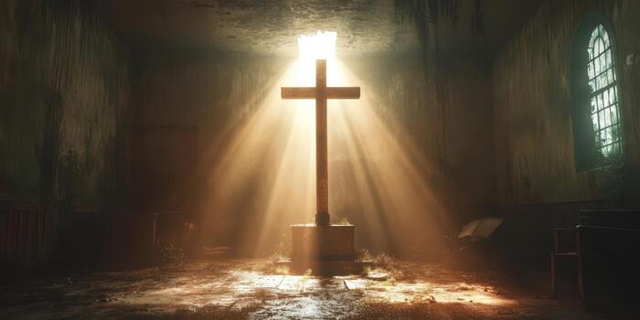 Light beams illuminate a weathered cross in a serene, abandoned church setting at dusk photo