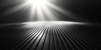 Lines on a dark surface illuminated by bright light create a striking contrast in an abstract setting photo