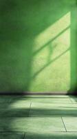 Bright green wall casting interesting shadows during afternoon sunlight in a minimalist interior space photo