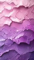 Vibrant layers of textured pink and purple paint create an abstract design full of depth and movement in a studio setting photo