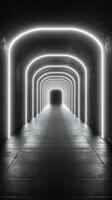 Illuminated tunnel with glowing arches creates a mysterious pathway in dark surroundings photo