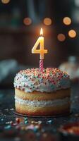 Sweet celebration with a colorful cake and candle marking a special fourth birthday photo
