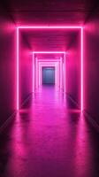 Bright pink neon lights illuminate a long hallway creating a vibrant futuristic atmosphere photo
