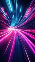 Colorful neon light trails create a dynamic and vibrant cityscape at night photo