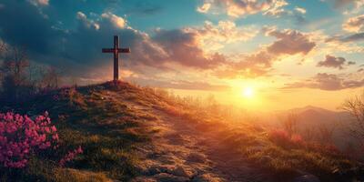 Sunset over a hilltop cross with vibrant clouds and blooming flowers in a tranquil landscape photo