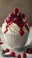Delicious dessert with whipped cream and cherry topping served in a bowl at a cozy cafe setting photo