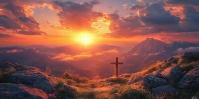Sunset over mountains with a cross on a grassy hilltop creating a serene atmosphere of reflection and peace photo