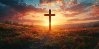 Sunset over a cross in a field of flowers with vibrant clouds on a serene evening photo