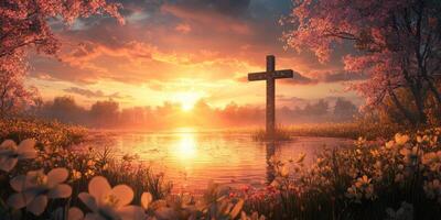 Scenic sunset over a tranquil lake with a wooden cross surrounded by blooming flowers photo