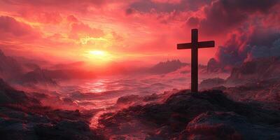 Sunset illuminates rocky seascape with a cross against a vibrant sky photo