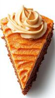Delicious slice of pumpkin cake with creamy frosting on a white background photo