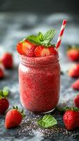 Refreshing berry smoothie with chia seeds and mint, perfect for a summer afternoon photo