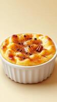 Creamy dessert served in a white dish topped with cinnamon and clove during a cozy setting photo