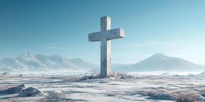 Snow-covered landscape with a large stone cross in a serene setting under a clear blue sky photo