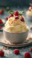 Delightful dessert served in bowl topped with fresh raspberries and crunchy bits showcasing culinary artistry photo