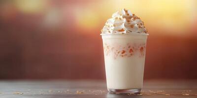 Creamy dessert drink topped with whipped cream and caramel, perfect for warm evenings photo