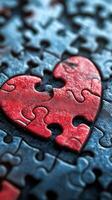 Heart-shaped puzzle piece stands out against a dark background showcasing love and connection photo