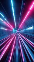 Lights illuminate a vibrant tunnel as a train speeds through during the night photo