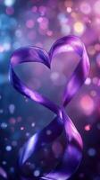 Purple ribbon twisted into a heart shape surrounded by a dreamy bokeh background photo