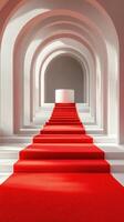 Vibrant red carpet leads to a striking architectural space with arches and a minimalistic pedestal photo