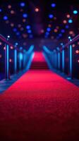 Vibrant red carpet leading up illuminated stairs in a stylish venue at night photo