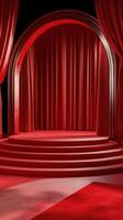 Stage set with red curtains and illuminated platform in a dramatic theater environment photo
